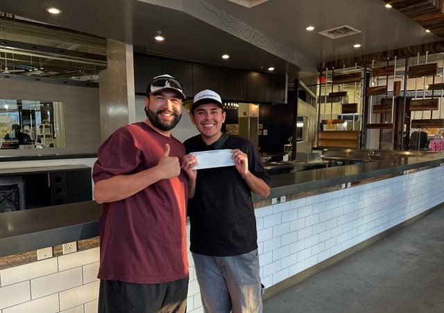 Two of the Concrete Coffee team inside the empty Union Market space before opening