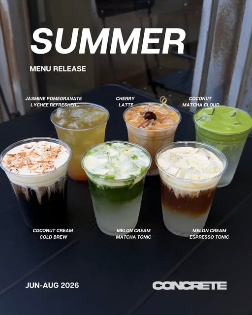 All six summer drinks lined up and labelled on a black table